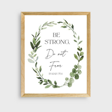 Load image into Gallery viewer, "Be Strong, Do Not Fear" - Isaiah 35:4 verse with botanical wreath on white background.  Wood frame.